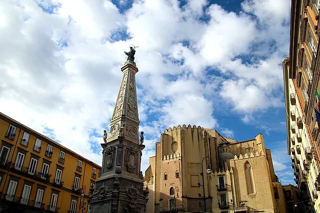 The Obelisk of San Domenico and the apse of San Domenico Maggiore in the historic centre of Naples